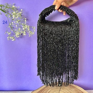 Bolso negro hecho a mano bordado a mano de primera calidad