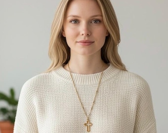 Collier croix en or 14 carats.