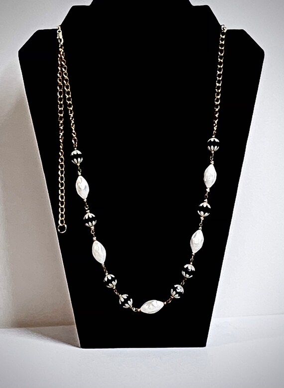 W - long beaded necklace with gold chain and white