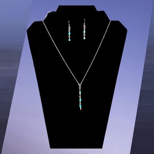 Gold Necklace and Earring Set. Aquarium gemstone and gold chain necklace and earring set. The perfect gift for any outfit or occasions.
