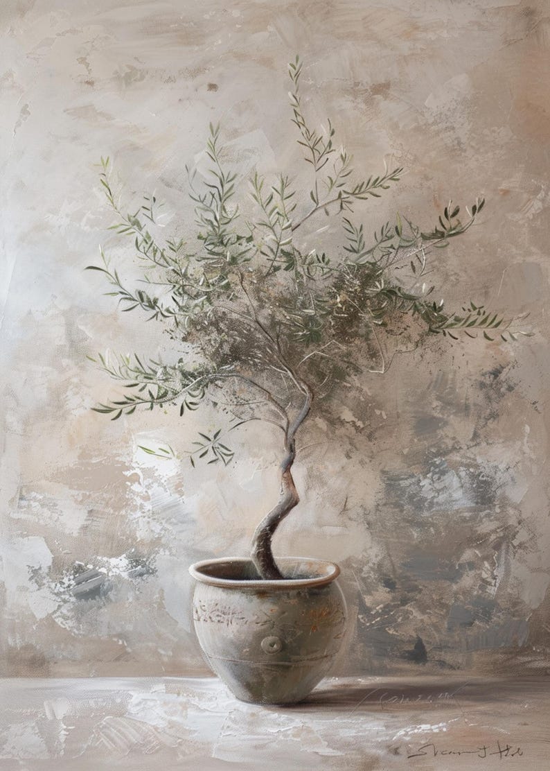 May include: A small olive tree with green leaves growing in a ceramic pot with a decorative design. The tree is against a light brown textured wall.