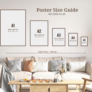 May include: A wall-mounted poster size guide displays ISO sizes A1-A5, with dimensions in inches and centimeters. The guide is above a sofa, with a length of 78 inches (198 cm). The room is decorated with pillows, a wooden coffee table, and a woven lamp.