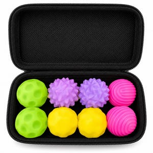 May include: A black zipped carrying case containing eight small sensory balls in various colours and textures. The set includes two lime green dimpled balls, two purple spiky balls, two yellow faceted balls, and two hot pink ribbed balls.