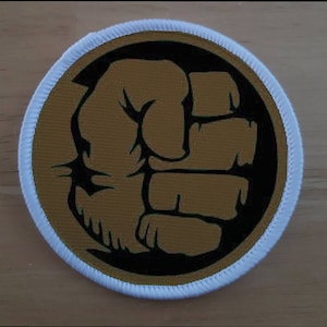 Brown Fist patch badge