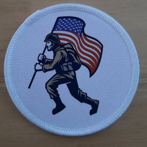 Military Soldier Carrying United States Flag Patch Badge