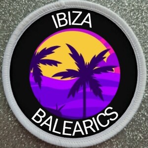 May include: White round patch with black text that says "IBIZA BALEARICS". The patch has a black background with a purple and yellow sunset and two palm trees.