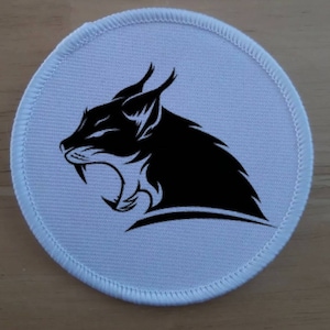 Lynx Black Cat badge