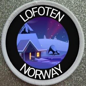 May include: A circular embroidered patch with a white border featuring a night scene of a cabin in Lofoten, Norway. The illustration shows a snow-covered landscape under a purple aurora borealis sky with the text LOFOTEN at the top and NORWAY at the bottom.