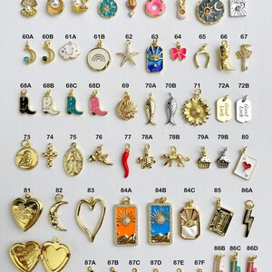 May include: Assortment of 87 gold-tone charms with various designs, including a seashell, a rainbow, a horseshoe, a cupcake, a red chili pepper, a cherry, a lightning bolt, a heart, a star, a fish, a cross, a sunflower, a key, a boot, a cassette tape, a locket, a moon, a turtle, a sun, a donut, a hot air balloon, a cowboy boot, a crown, a ladybug, and a  'Good Luck' tag.