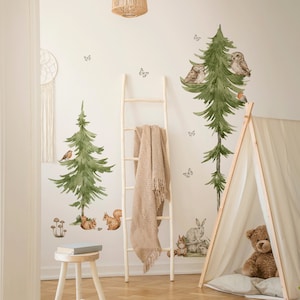 Könnte beinhalten: Ein Set mit Wandaufklebern von Waldtieren mit Eulen, Eichhörnchen, einem Kaninchen und einem Rotkehlchen. Die Aufkleber sind auf weißem Hintergrund gedruckt und eignen sich perfekt, um jedem Raum einen Hauch von Natur zu verleihen.