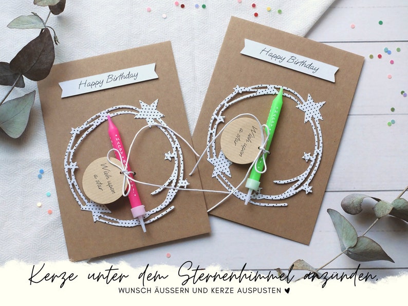May include: Two brown cardstock birthday cards with a white star design and a small candle. The text on the cards reads "Happy Birthday" and "Wish upon a star".