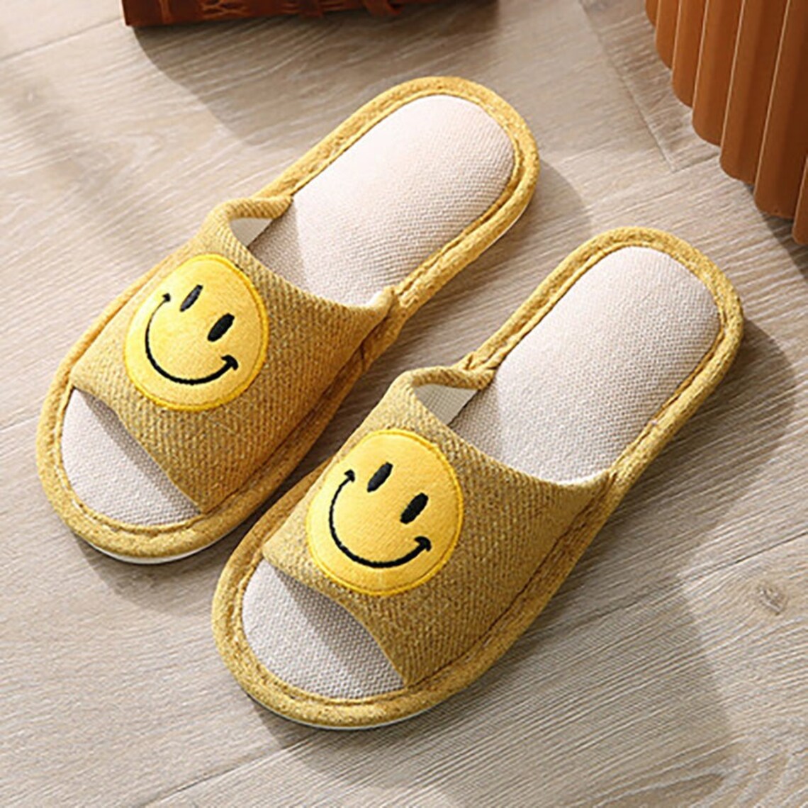 yellow smiley slippers