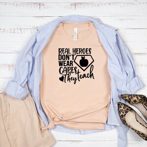 Real Heroes Don&#39;t Wear Capes They Teach Shirt, Teacher Appreciation Shirts, Teacher Shirts, Gifts for Teachers, Gift for Her; Teaching Shirt