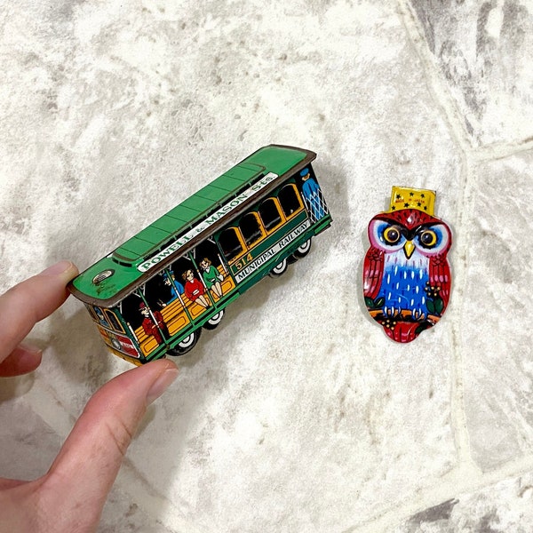 2 Vintage Tin Litho Toys Trolley Cable Car Toy & Owl Clicker Toy