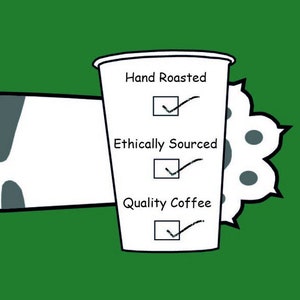A white coffee cup featuring a checklist with the text Hand Roasted, Ethically Sourced, and Quality Coffee, each with a checkmark. The cup is held by a white and grey patterned cat paw against a solid green background.