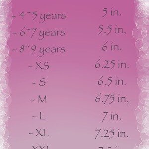 May include: A pink size chart with white bubble accents. The chart lists age ranges from 4-5 years to XXL, with corresponding measurements in inches, ranging from 12.7 cm to 19.05 cm.