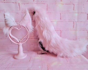 Cola y orejas de cachorro rosa