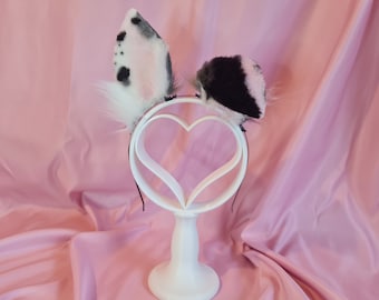 Gevlekte pastelkleurige puppyoren
