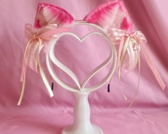 Orejas de gato rosas