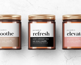 May include: Three amber glass candle jars with gold lids and white labels. The labels have the text "your candle co." and the names of the scents: "soothe", "refresh", and "elevate". Each label also lists the scent notes and the text "soy wax candle".