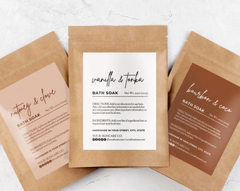May include: Three brown paper pouches with labels for bath soaks. The labels are white with brown text and feature different scents: nutmeg & clove, vanilla & tonka, and bourbon & cocoa.