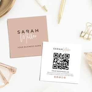 May include: Two square business cards with the name "Sarah Miller" printed on them. One card is blush pink with the name and "Your Business Name". The other card is white with a QR code and contact information.