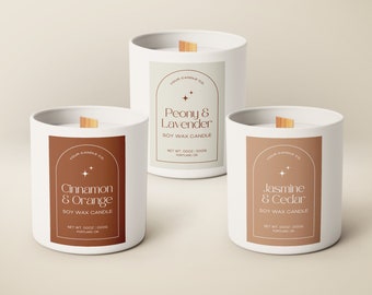 May include: Three white soy wax candles with wooden wicks and brown labels. The labels have a white arch with two stars and the text "YOUR CANDLE CO". The candles are labeled "Cinnamon & Orange", "Peony & Lavender", and "Jasmine & Cedar".