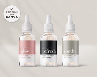 May include: Three glass bottles with dropper tops and labels. The bottles are filled with a clear liquid. The labels are white with black text and the words "glow", "refresh", and "soothe". The bottles are on a light brown surface.