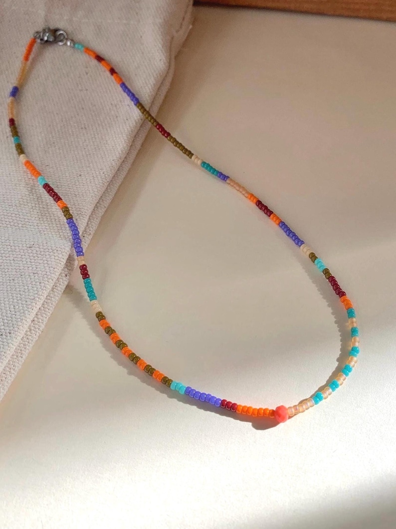 summer beach necklace with tiny beads. multicolor necklace trendy necklace. bright colors vivid colors with turquoise orange purple pink tones
