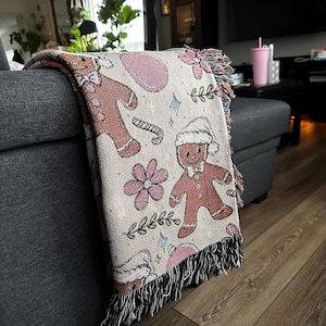Gingerbread man Woven Blankets for Christmas pink decor or winter home decor.