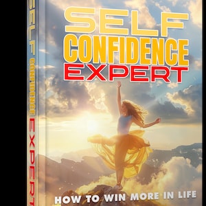 Op de afbeelding: Een boekomslag met een vrouw in een gele jurk die op een bergtop staat met haar armen omhoog. De titel van het boek is "Self Confidence Expert" en de ondertitel is "How to Win More in Life".