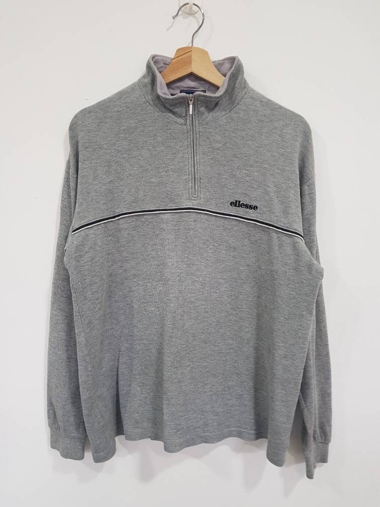 ellesse quarter zip