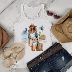 May include: White tank top featuring a graphic print of a woman in a straw hat and sunglasses standing on a beach with palm trees and a suitcase. The tank top is paired with denim shorts, a brown belt with turquoise stones, a brown leather bag, a straw cowboy hat, and gold sandals.