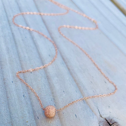 Collier en perles d'étoiles remplies d'or rose 14 carats