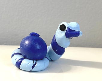 blueberry snake clay figure