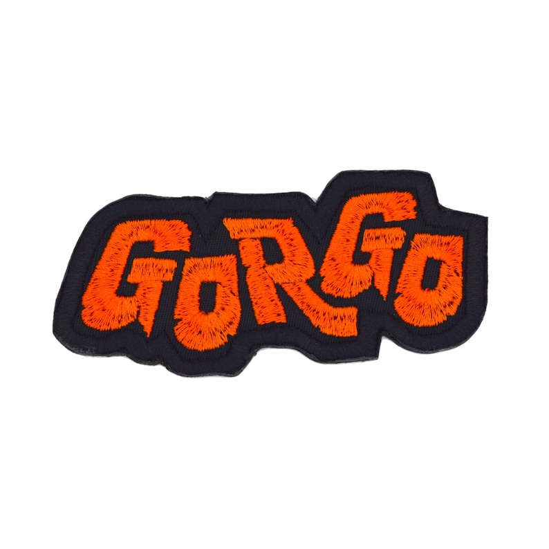 Orange and black embroidered logo patch for the classic Kaiju monster movie Gorgo.
