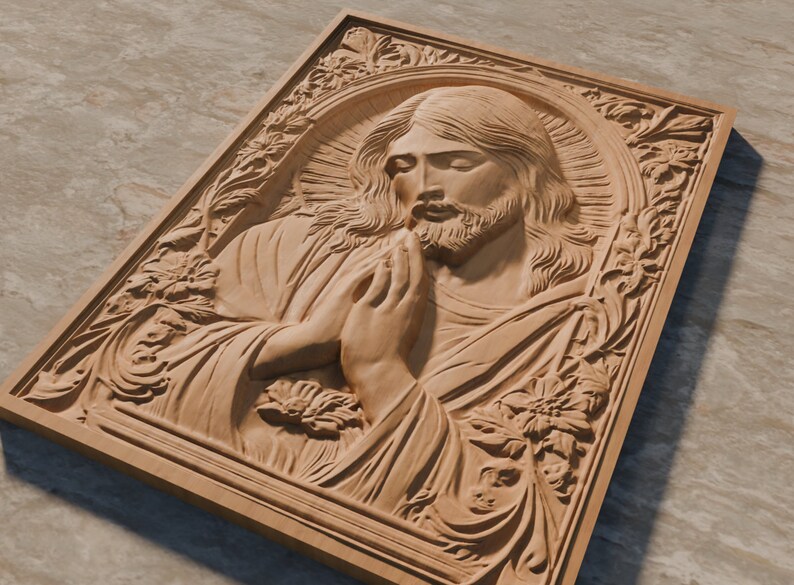 May include: A wooden carving of Jesus Christ with his hands clasped in prayer. The carving is detailed and realistic, with a halo around Jesus' head. The carving is framed with a decorative border.