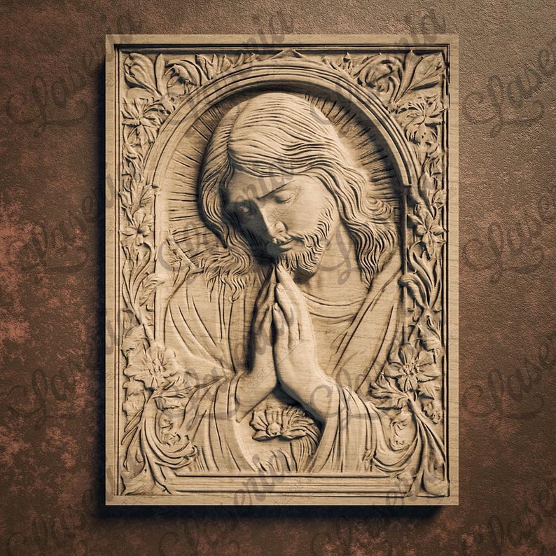 May include: A wooden carving of Jesus Christ with his hands clasped in prayer. The carving is framed with a floral design and is set against a brown background.