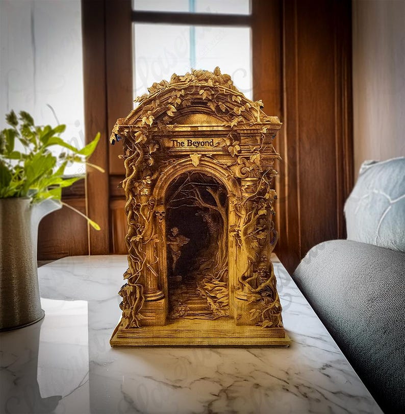 May include: A wooden sculpture of an archway with intricate carvings and vines. The archway is labelled "The Beyond" and depicts a dark, wooded path.