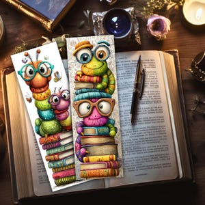 May include: Two colourful bookmarks featuring cartoon caterpillars wearing glasses and holding books. One caterpillar is green, yellow, and orange, the other is pink, blue, and purple. Butterflies and books are also visible.