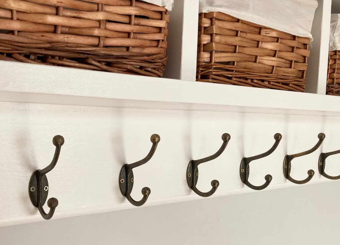 Wall mounted coat hooks with shelf and 3 storage baskets. Etsy