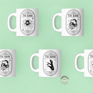 May include: Set of six white ceramic mugs with black and white illustrations. The mugs feature different designs with the text "The Babe", "The Coven", and "The Bride".