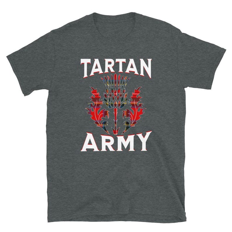 May include: Dark gray t-shirt featuring the text "TARTAN ARMY" in white, with a red, black, and yellow thistle design in the center. The shirt is a short-sleeved crew neck.