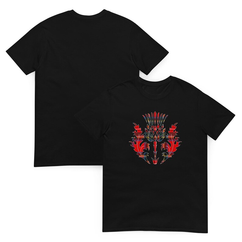May include: A black short-sleeved t-shirt featuring a graphic of a thistle on the front. The thistle design is filled with a red, blue, and yellow plaid tartan pattern. The back of the t-shirt is plain black, showing a simple crew neck design.