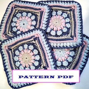 May include: Four crocheted squares in shades of blue, pink, and beige. The squares have a floral design in the center and are layered on top of each other. The text "PATTERN PDF" is printed on a pink banner at the bottom of the image.