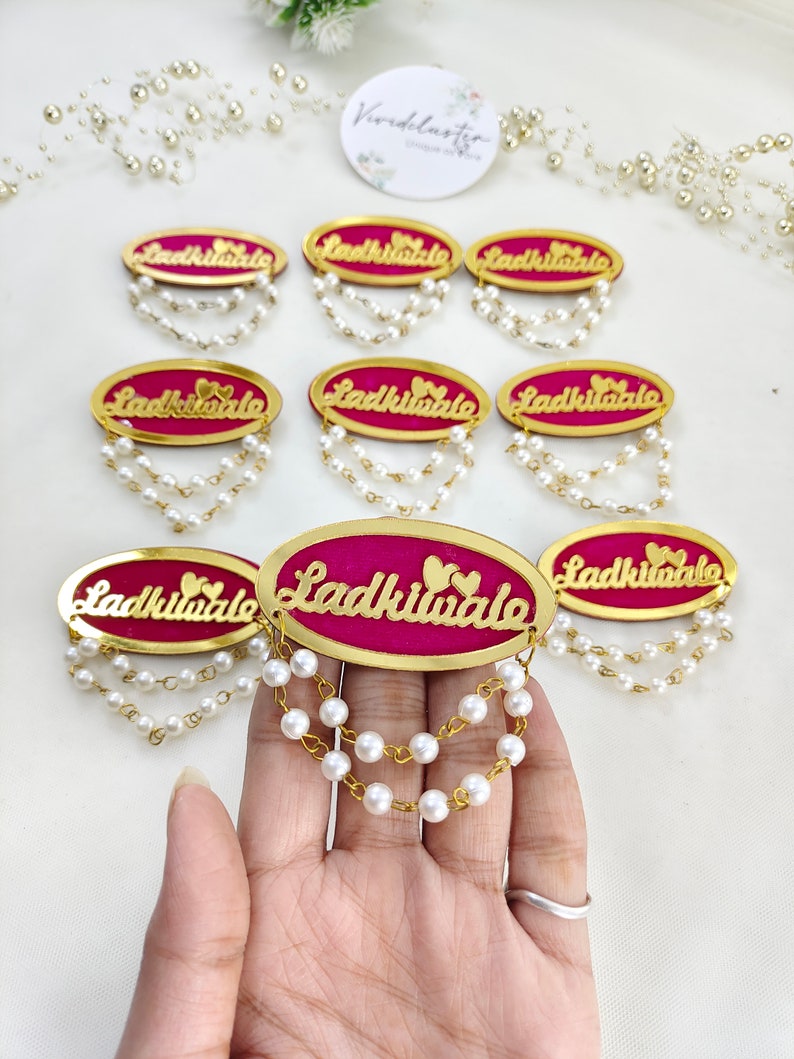 Exclusive Ladkiwale brooches with pearls, ideal for weddings and marriage celebrations. These elegant pins are perfect for bridesmaids and add a luxurious touch to bridal attire.