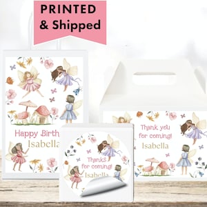 May include: White party favor boxes and stickers with a fairy theme. The boxes and stickers feature illustrations of fairies, mushrooms, and flowers. Text includes "Happy Birth Isabella" and "Thank you for coming! Isabella."