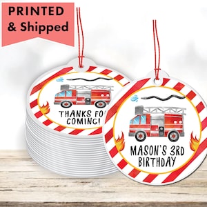 May include: Red and yellow round favor tags with a watercolor illustration of a fire truck. The text on the tag reads "Thanks for coming!" and "Mason's 3rd Birthday".
