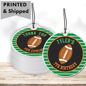 May include: Green and orange striped circle favor tags with a black center circle. The center circle has a football graphic and the text "Thank You For Coming" or "Tyler's 7th Birthday".