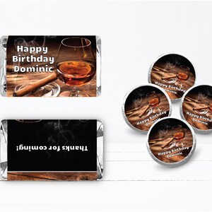 a set of four happy birthday chocolates with a picture of a glass of wine